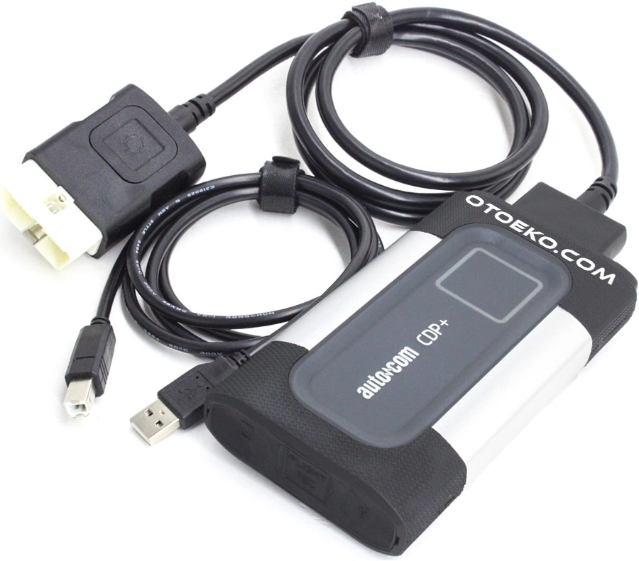 Autocom CDP+ cihazı, sarılı 16 pin OBD kablosu ve USB bağlantı kablosu.